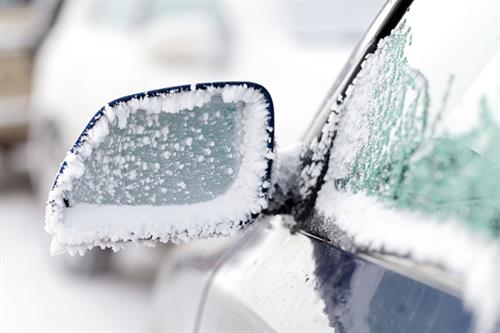 winter driving frozen car mirror